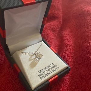 White lab created sapphire pendant with necklace.New.